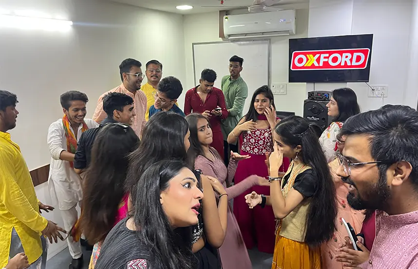 Oxford Software Institute students celebrating Dandiya Night with traditional wear and joyful dance